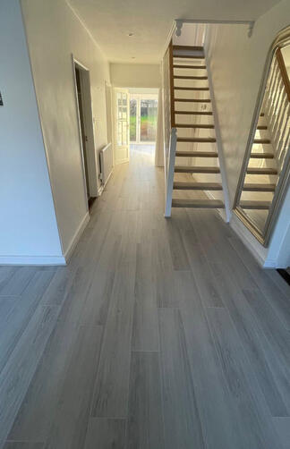 Grey laminate plank hallway
